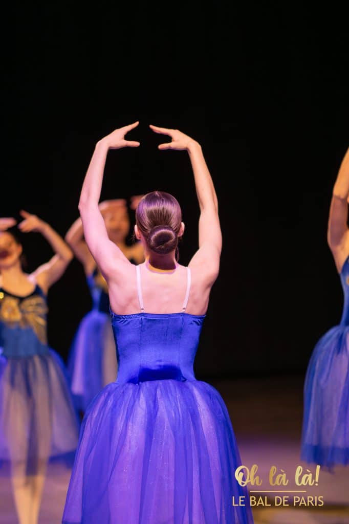 Ballet dancers perform on stage